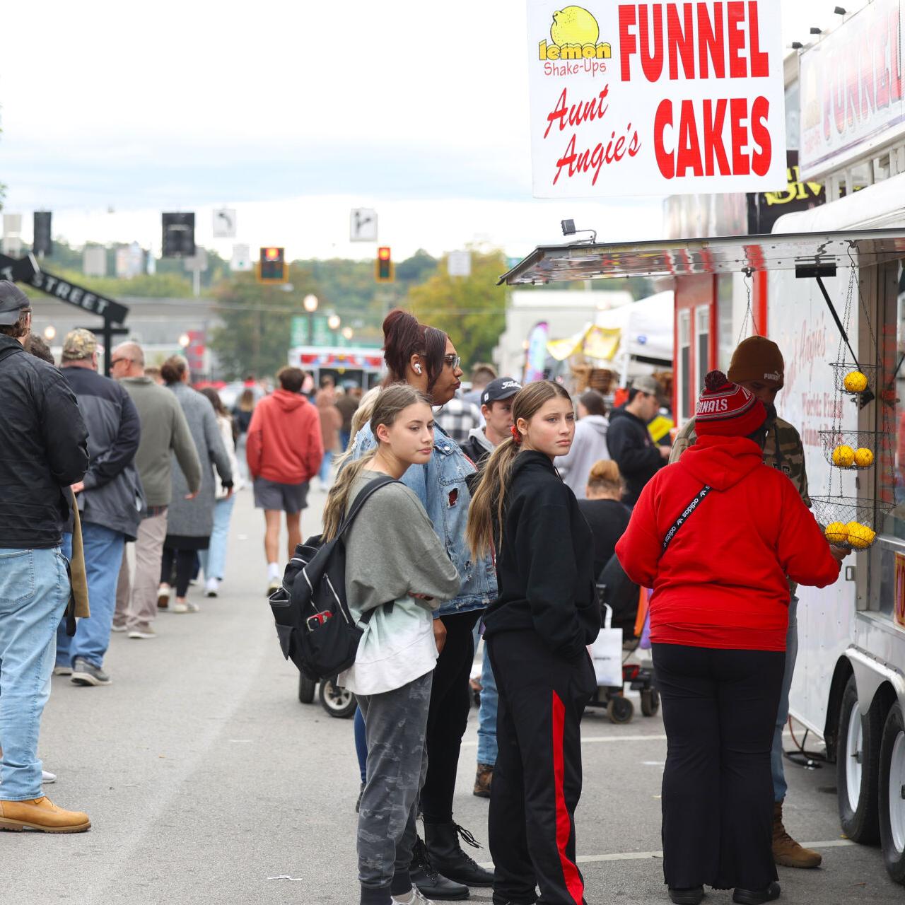 People wait in line at Harvest Homecoming.JPG